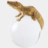 Alligator on Orb, Brass